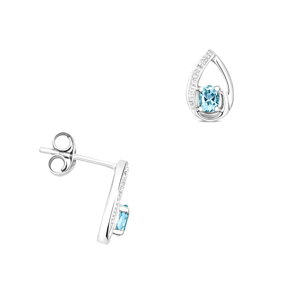 4 prong setting oval shape aquamarine and side stone earring