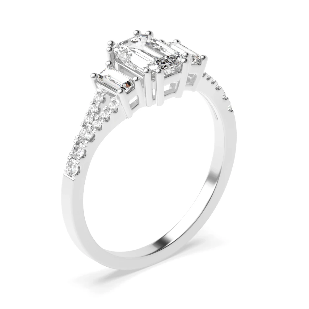 Split Shoulder Emerald Diamond Trilogy Engagement Rings
