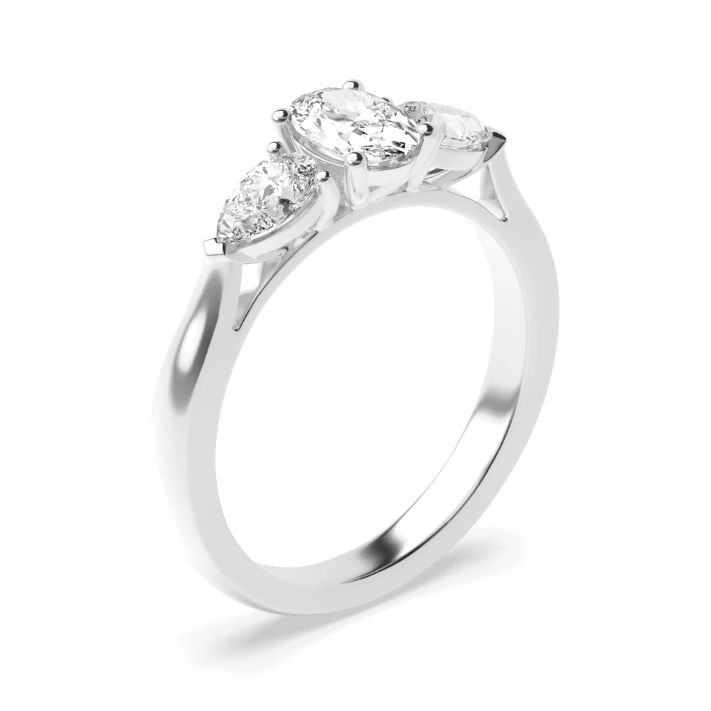 Prong Setting Oval & Pear Trilogy Diamond Engagement Ring in White gold