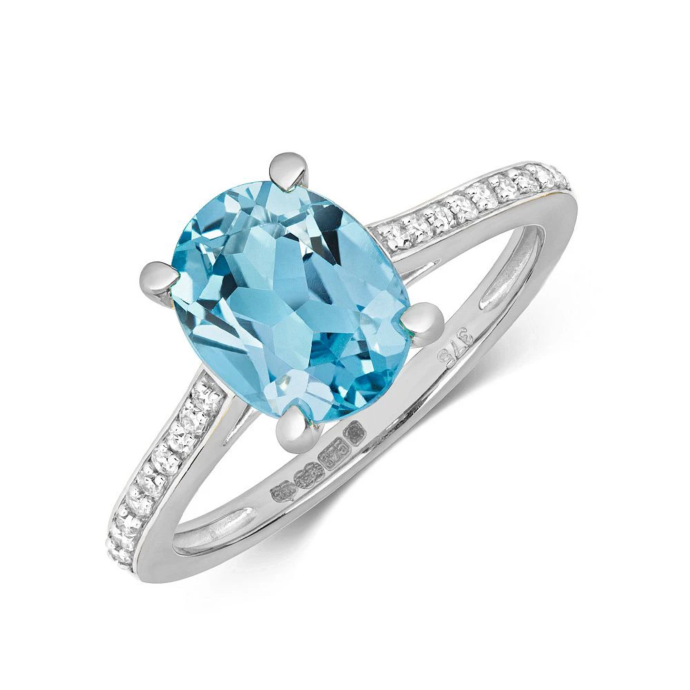 Gemstone Ring With 9X7mm Oval Shape Blue Topaz and Diamonds