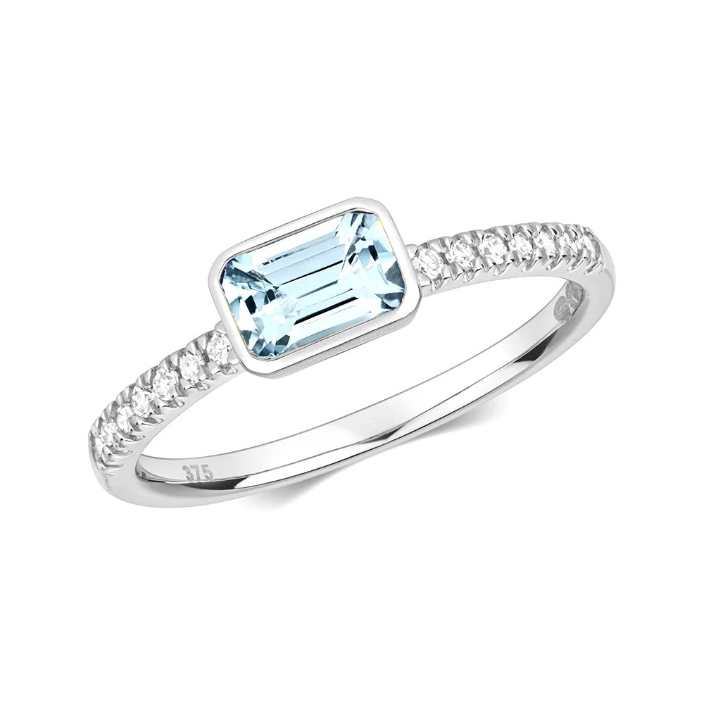 bezel setting emerald shape color stone and side round diamond ring