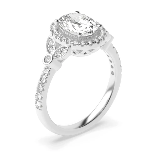 4 prong setting oval shape side stone diamond ring