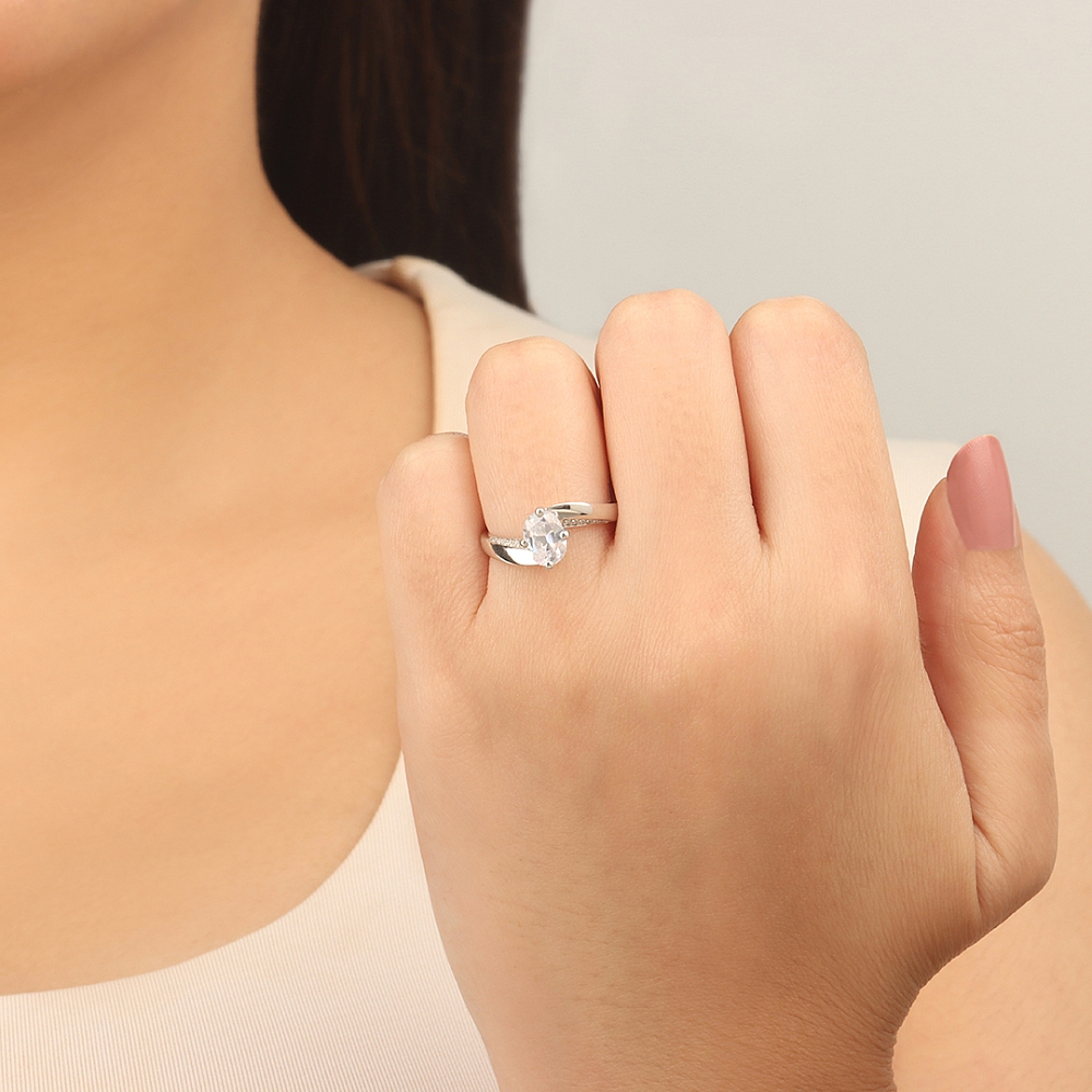 Oval Twist Side Stone Engagement Rings