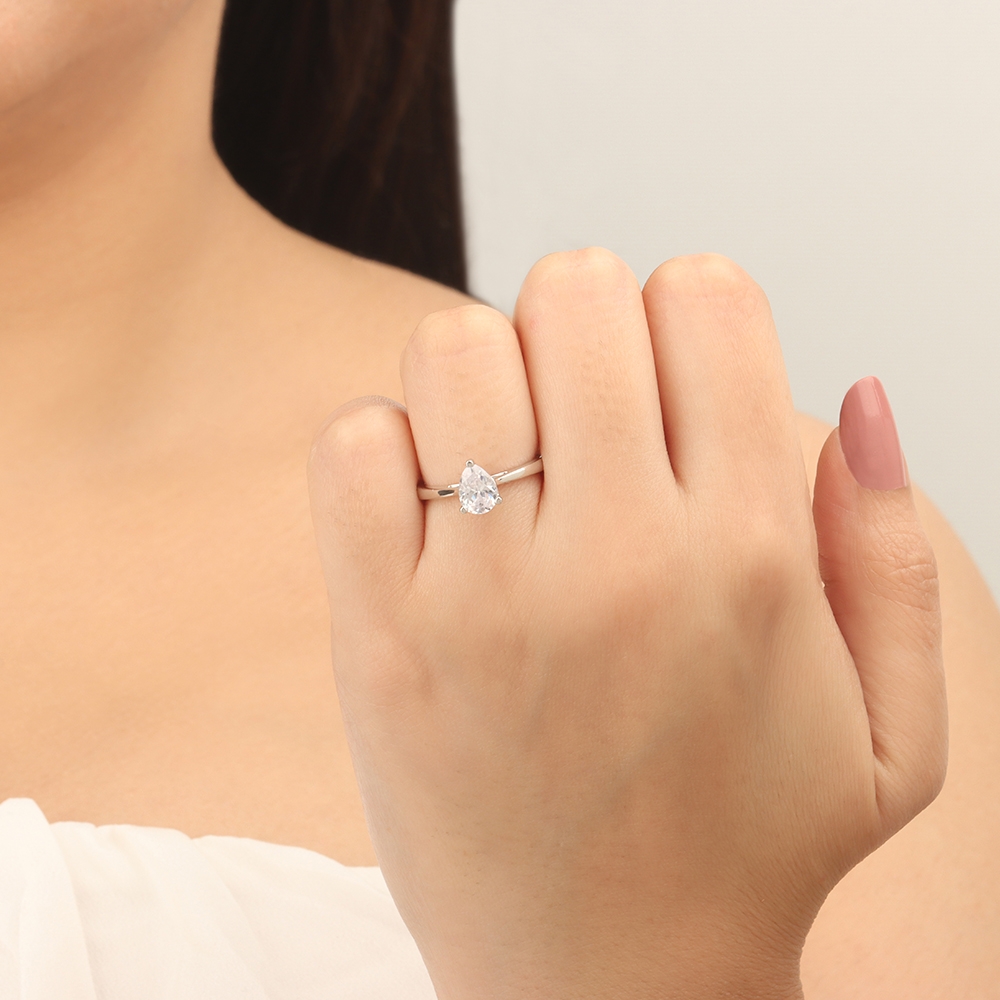 Prong Pear Delicate tapering shoulder Engagement Rings