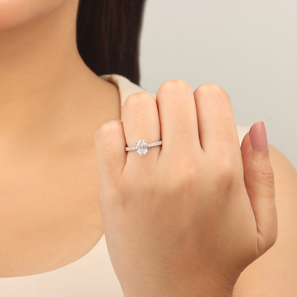 Oval Prong set side stone Side Stone Engagement Rings