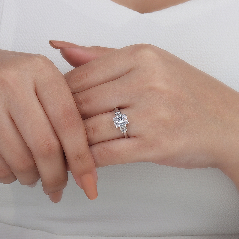 Emerald Step shoulder Engagement Rings