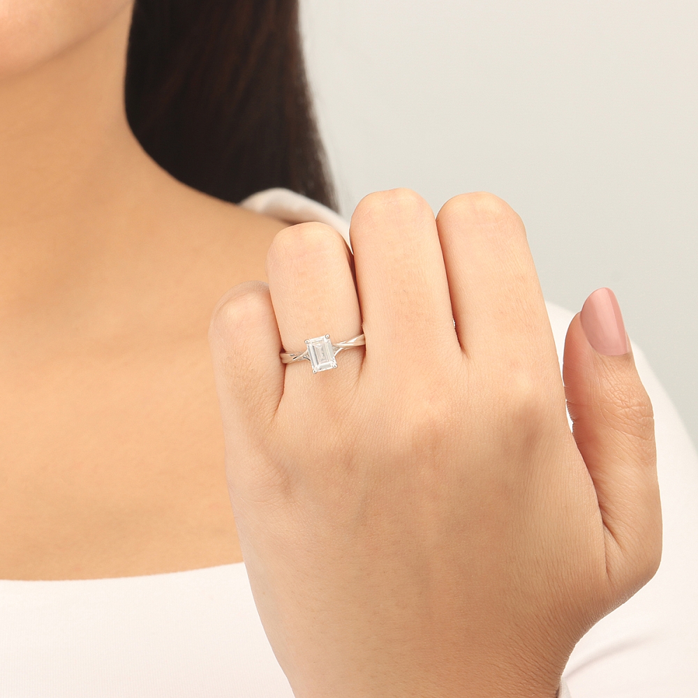 Emerald Crossover shoulder Engagement Rings