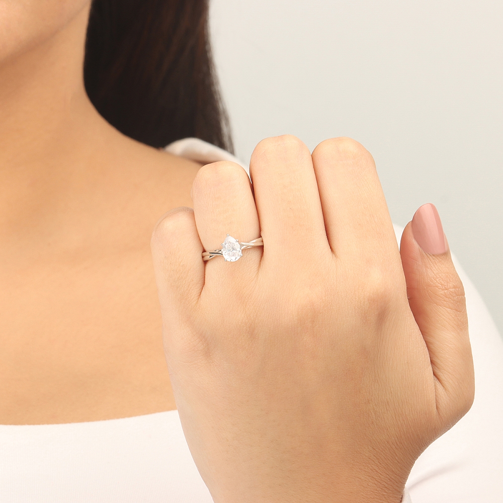 Prong Pear Crossover shoulder Engagement Rings