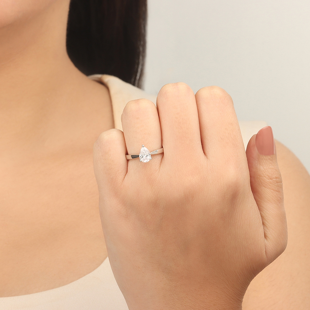 Prong Pear Open set tapering shoulder Engagement Rings