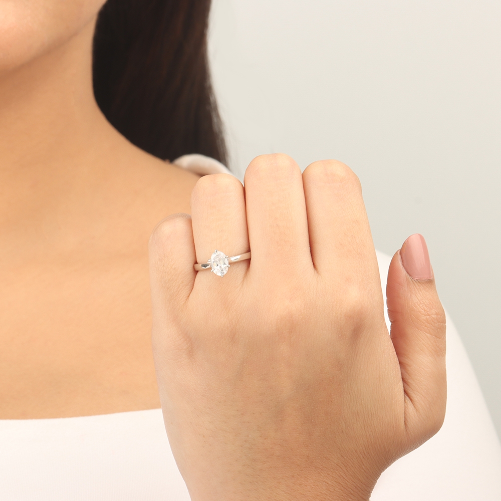 Oval Flower setting Solitaire Engagement Rings