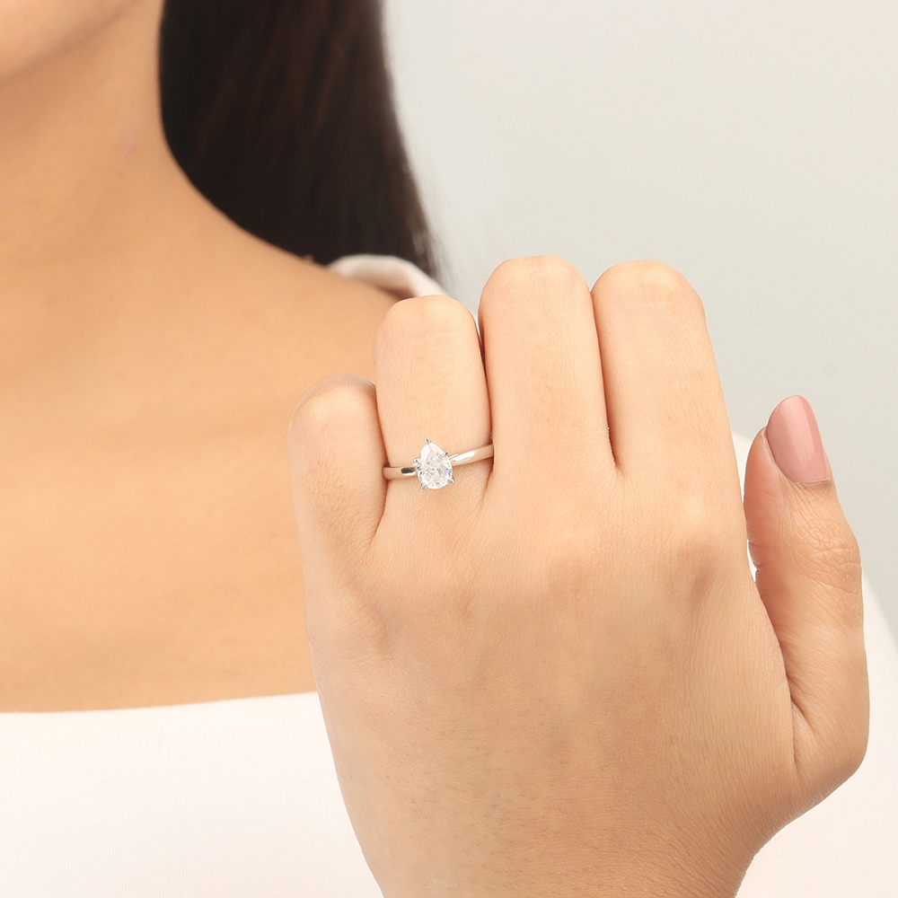 Prong Pear Flower setting Engagement Rings