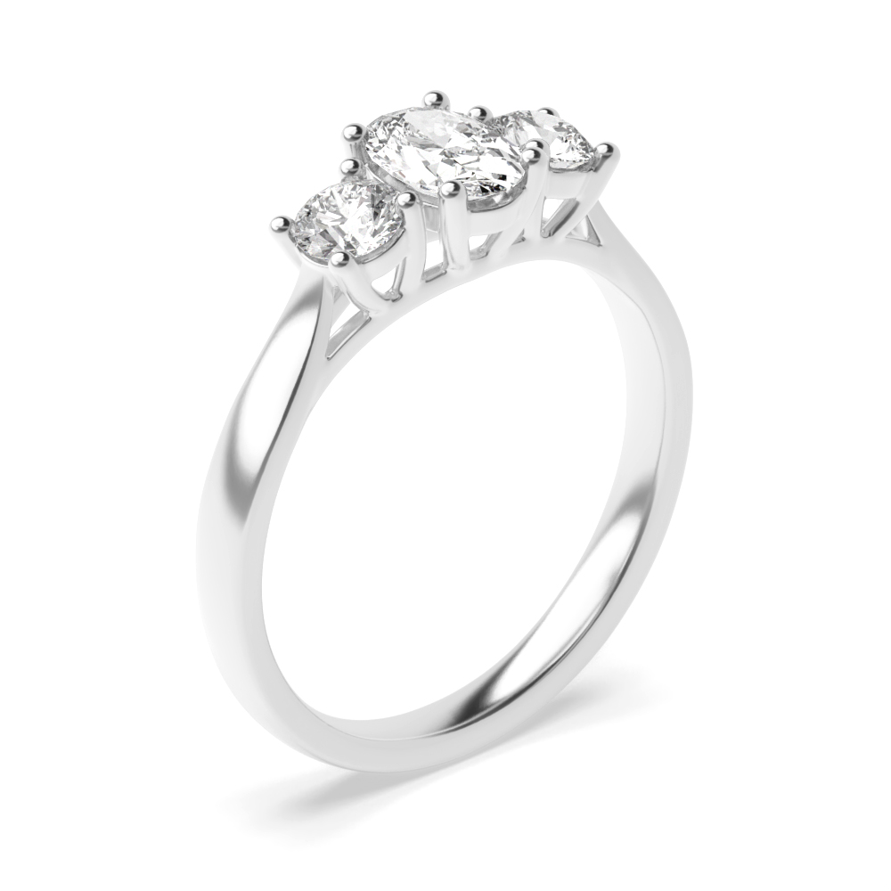 Oval in Centre and Round Side Diamond Trilogy Engagement Rings