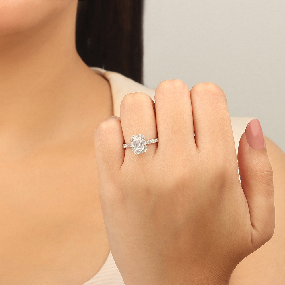 Emerald Shoulder set Engagement Rings