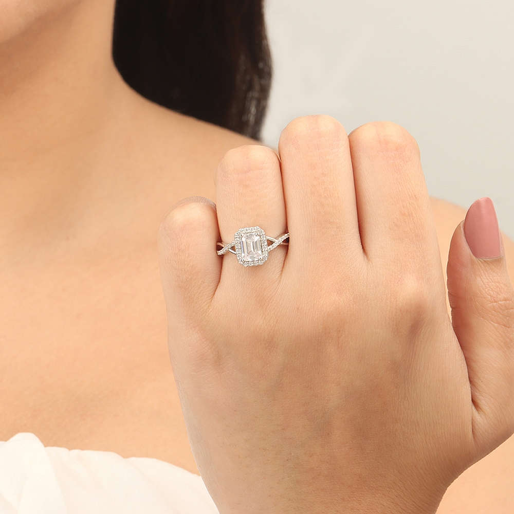 Emerald Intervene shoulder Engagement Rings