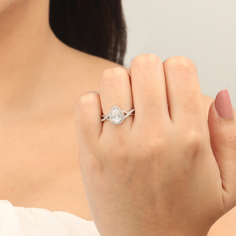Prong Pear Intervene shoulder Engagement Rings