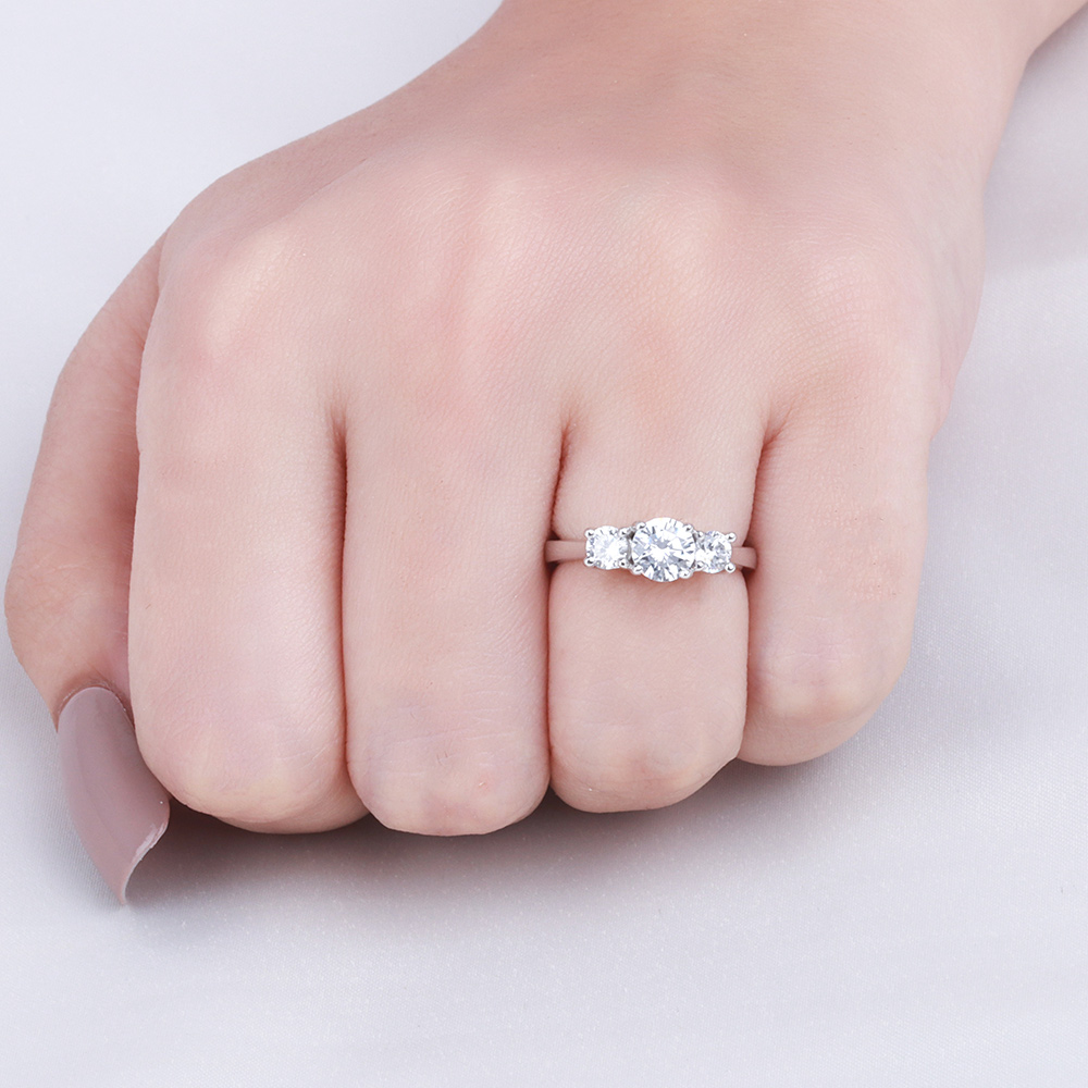 4 Prong Round Cross Over Claws Moissanite Three Stone Engagement Ring