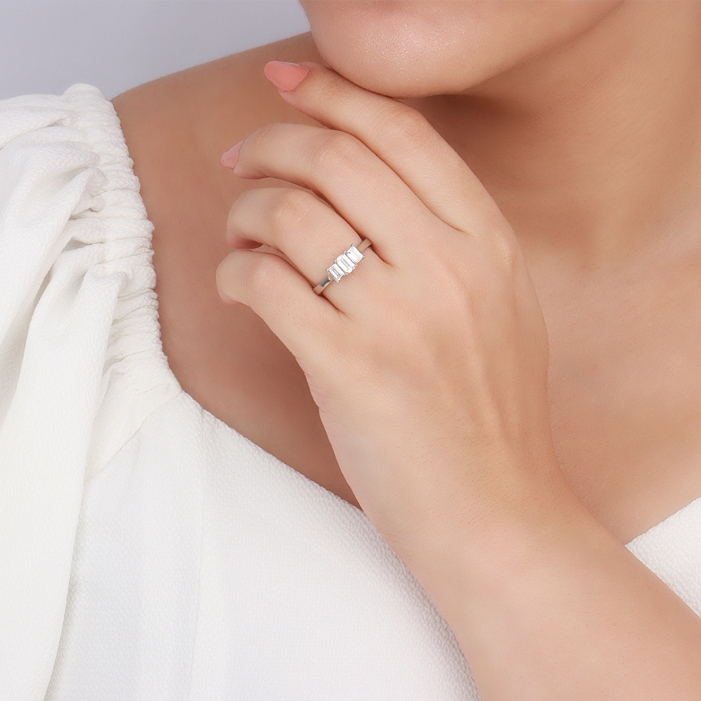 4 Prong Emerald Raised Setting Three Stone Engagement Ring