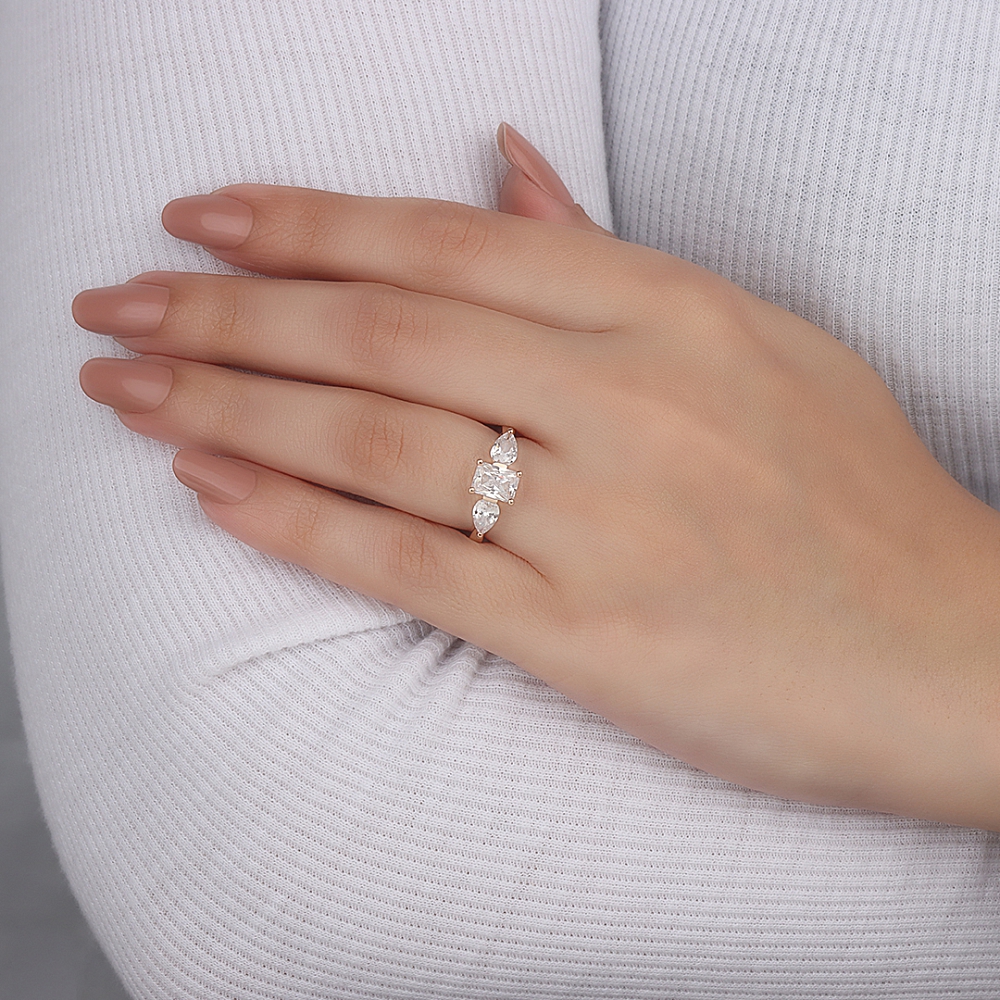 4 Prong Emerald With pear on side Engagement Rings