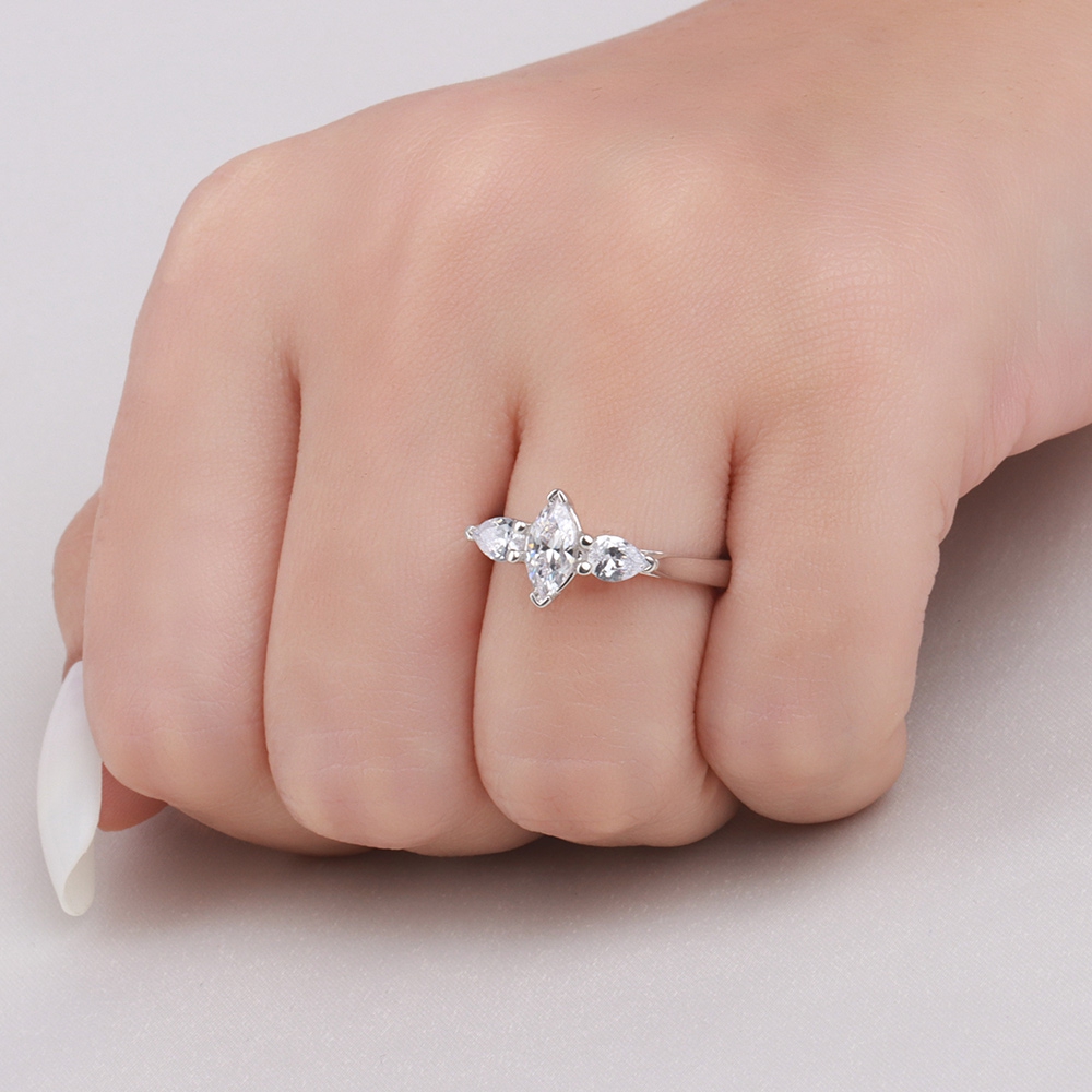 6 Prong Marquise And Pear Shape Three Stone Engagement Ring