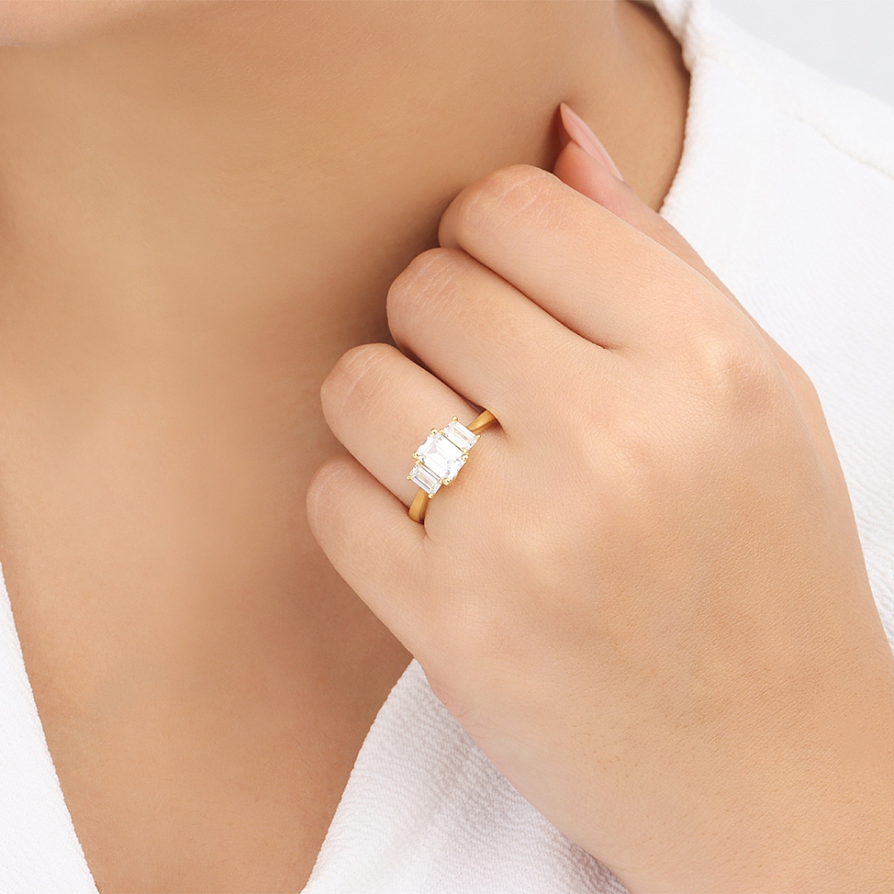 Emerald trelis crossover Engagement Rings