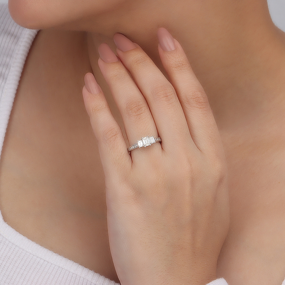 Emerald Shoulder set Engagement Rings