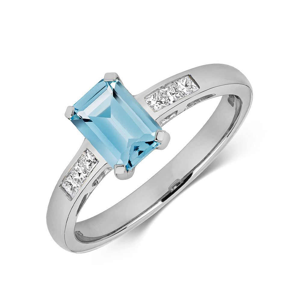 Gemstone Ring With 7X5Mm Emerald Shape Blue Topaz And Diamond