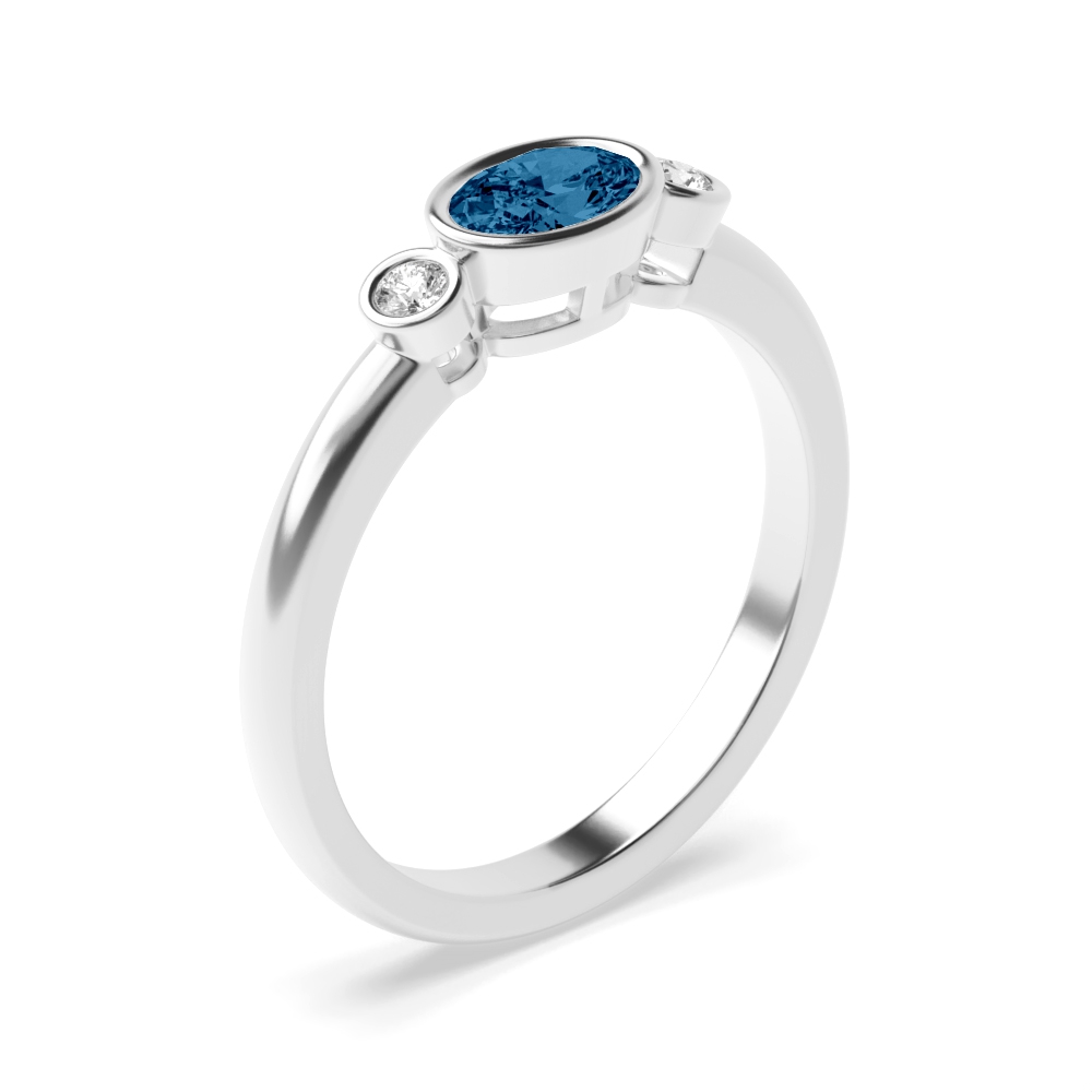 6X4mm Oval Blue Topaz Three Stone Lab Grown Diamond And Gemstone Engagement Ring