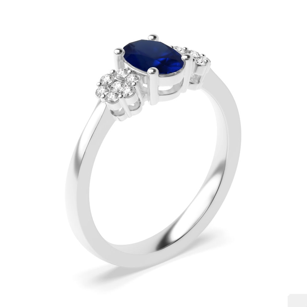 7X5mm Oval Blue Sapphire Side Stone Diamond And Gemstone Engagement Ring