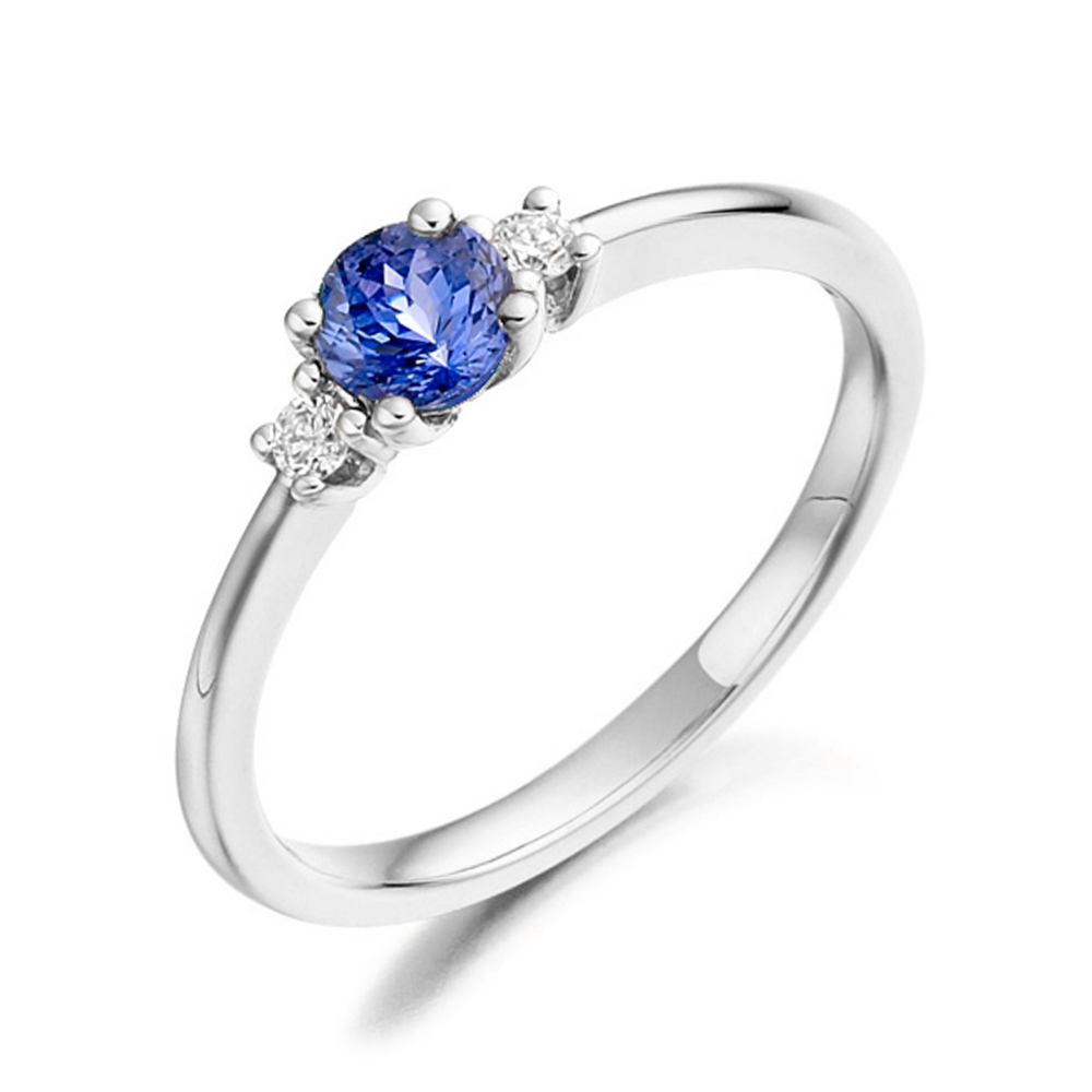 5X4Mm Oval Tanzanite Trilogy Diamond And Gemstone Engagement Ring