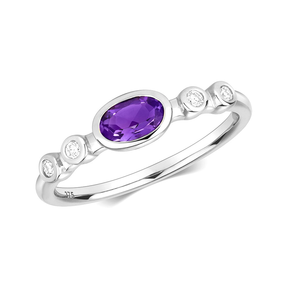bezel setting oval shape color stone and round diamond ring