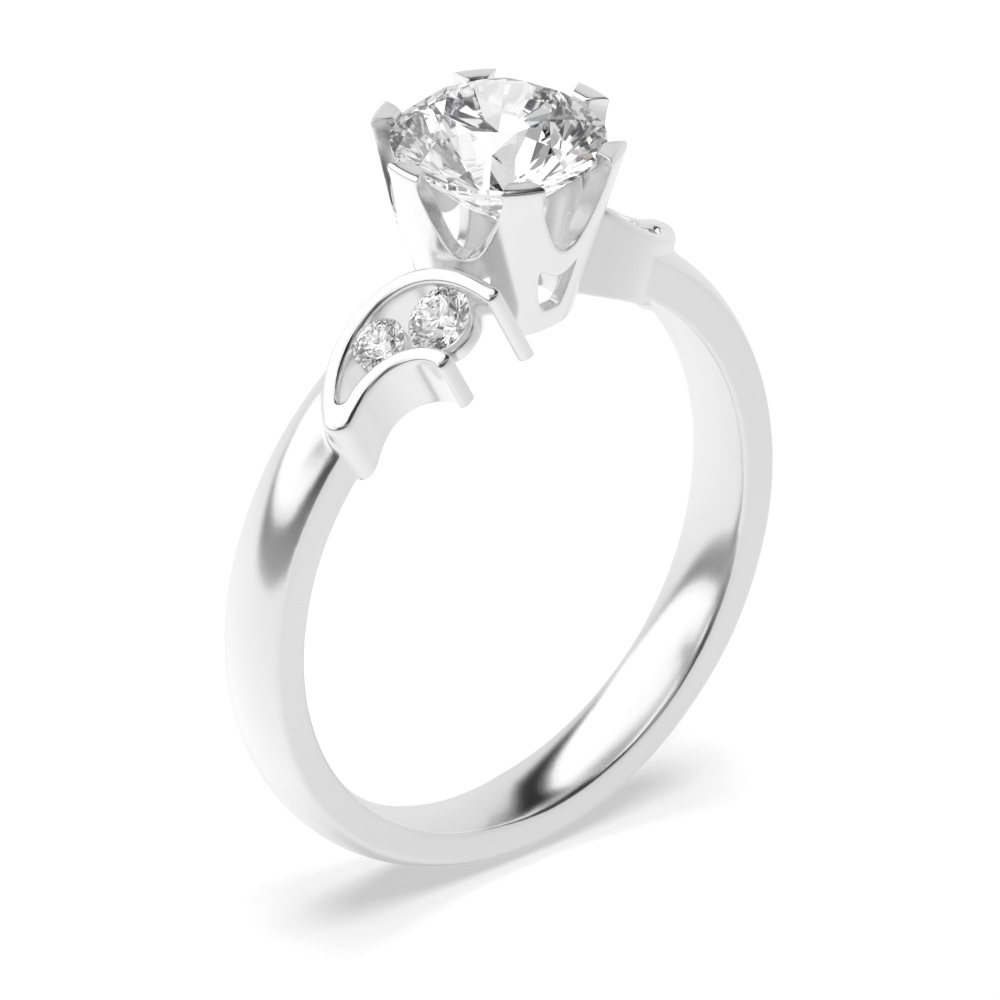 prong setting an elegant round brilliant cut Lab Grown Diamond ring with shoulder stones ring