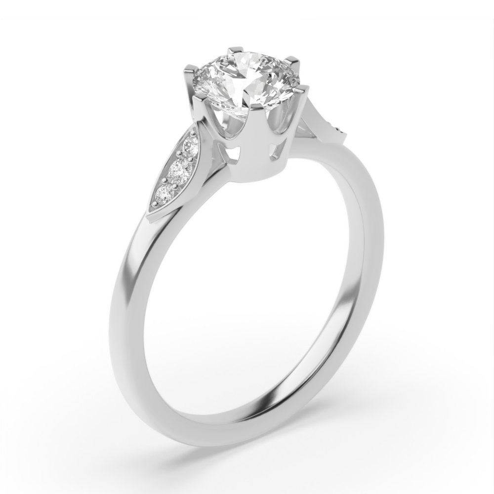 prong setting a stunning round brilliant cut Lab Grown Diamond ring with shoulder stones ring