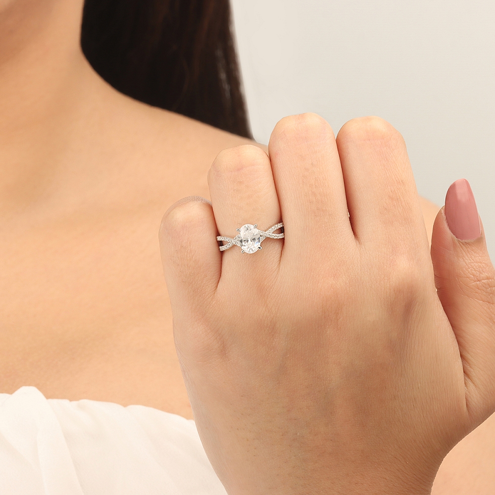 4 Prong Oval hidden halo crossed shoulder Engagement Rings