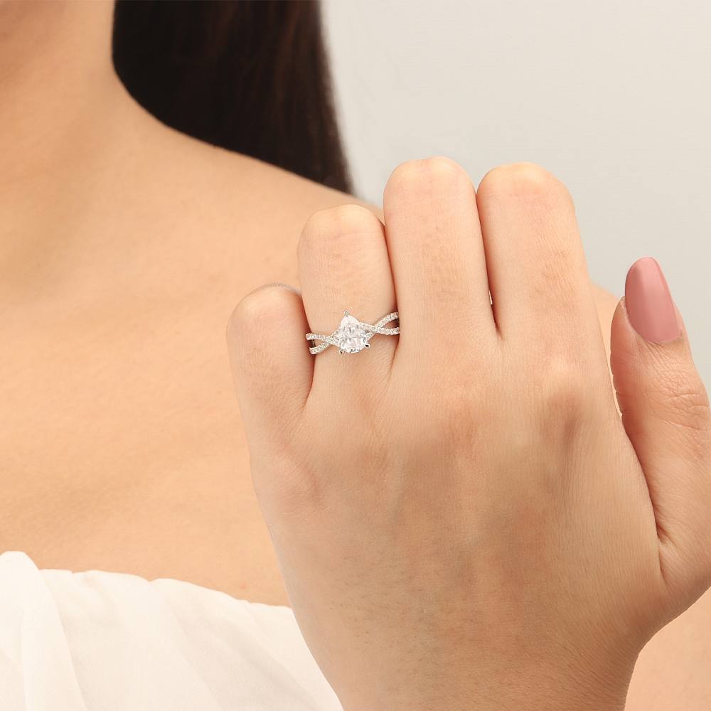 Prong Pear hidden halo crossed shoulder Engagement Rings