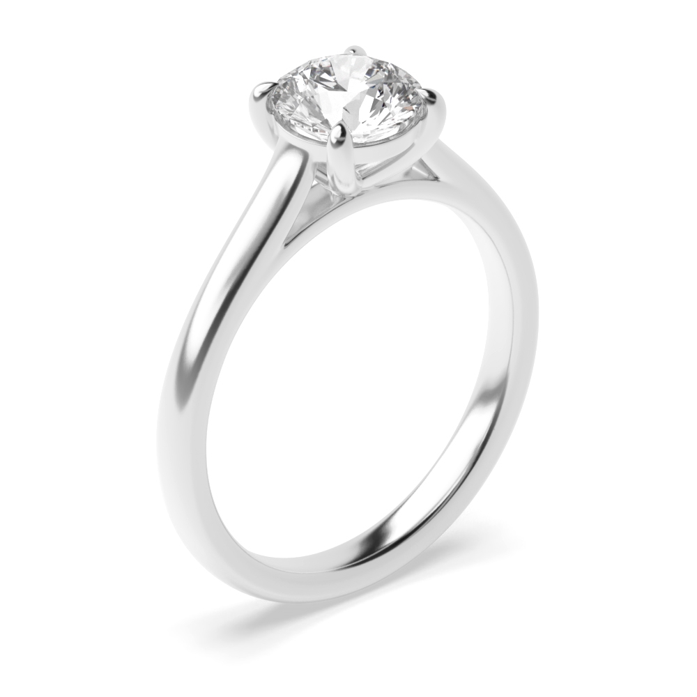 4 prong set accentuates the brilliance of the round shaped Moissanite classic solitaire ring