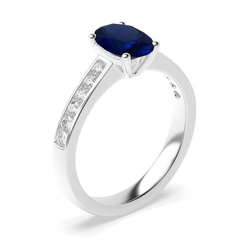 Oval Diamond set on shoulder Blue Sapphire Engagement Rings
