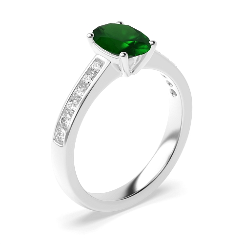 Oval Diamond set on shoulder Emerald Engagement Rings