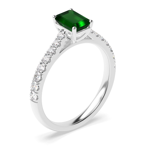 Prong set side stone Emerald Side Stone Engagement Rings