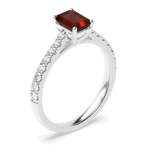 Prong set side stone Garnet Engagement Rings