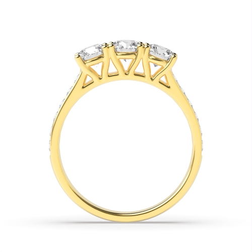 4 Prong Round Yellow Gold Channel Set side Three Stone Engagement Ring