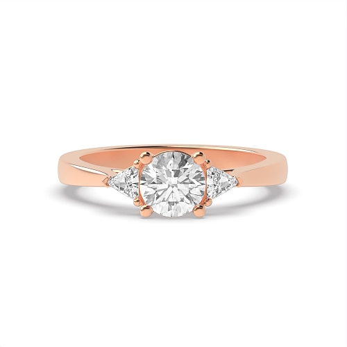Round/Trillion Rose Gold Raised set Trilogy Engagement Rings
