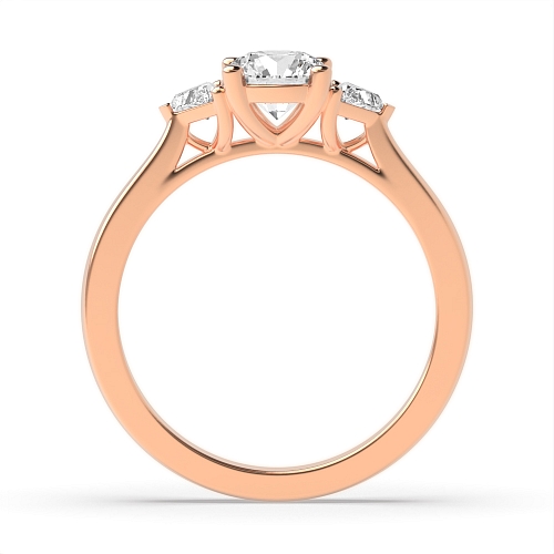 Round/Trillion Rose Gold Raised set Trilogy Engagement Rings