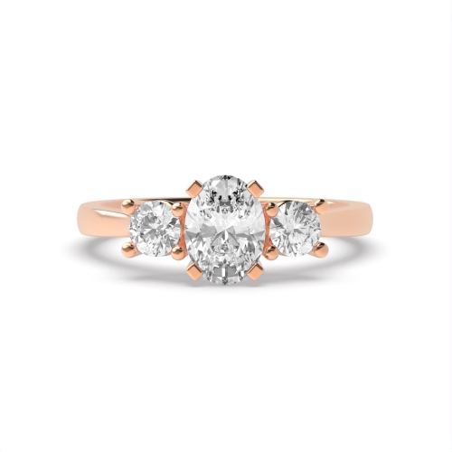 4 Prong Oval Rose Gold And round graduated Trilogy Engagement Rings
