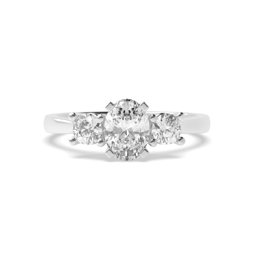 4 Prong Oval Platinum And round graduated Trilogy Engagement Rings