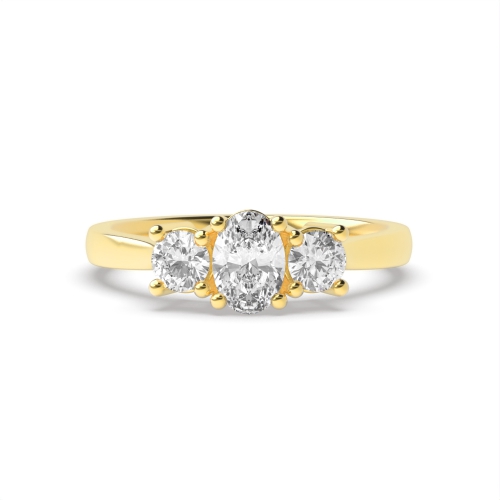 4 Prong Oval Yellow Gold And round Trilogy Engagement Rings