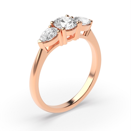 4 Prong Round Rose Gold With pear on side Trilogy Engagement Rings