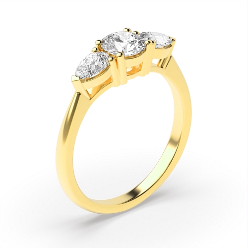 4 Prong Round Yellow Gold With pear on side Engagement Rings