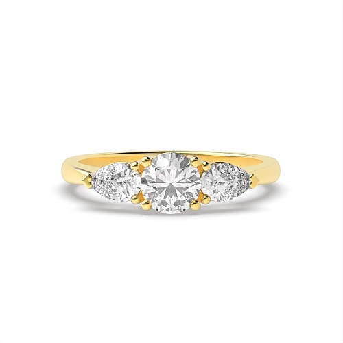 4 Prong Round Yellow Gold With pear on side Engagement Rings