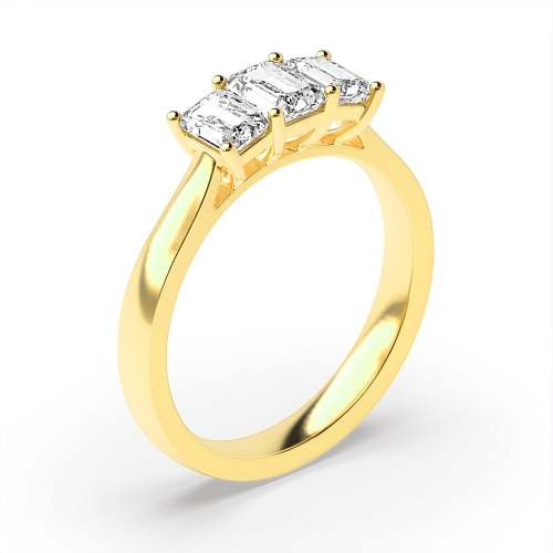 4 Prong Emerald Yellow Gold Raised setting shared claw Trilogy Engagement Rings