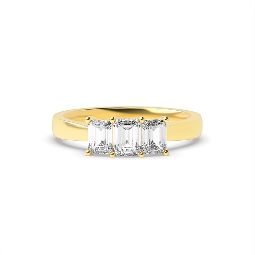4 Prong Emerald Yellow Gold Raised setting shared claw Trilogy Engagement Rings